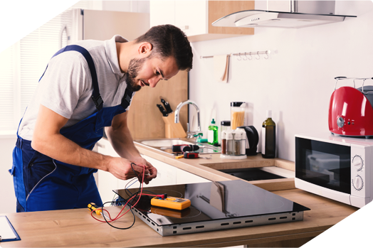 Technician repairing an oven, providing professional appliance repair services.