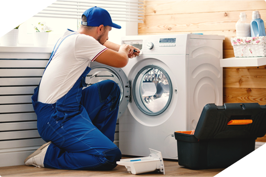 Technician repairing a stovetop, providing expert appliance repair services.